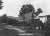 Unidentified two chimney house with landscaping, Williamsville, Vt.