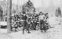 Will Howe and Clarence Struthers chopping in wood in Vermont