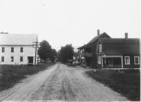 Wilkins Inn on right and RR crossing in the distance, West Dumerston, Vt.