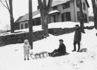 Frank, Ralph, and Deweese Dewitt with sleds, Newfane, Vt.