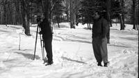 Two men surveying
