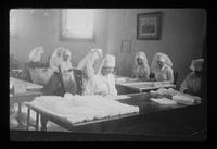 World War I, Mrs. Norton and ladies wrapping bandages