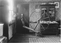 Interior with spinning wheel, Williamsville, Vt.