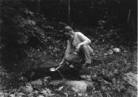 Mr. French, prospector at a water spring