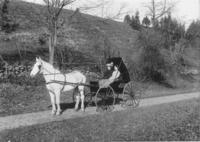 Two women in a horse drawn carriage, Wardsboro, Vt.