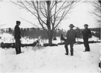 Men and dog on a coon hunt, Williamsville, Vt.