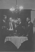 Congdon and men around a formal table