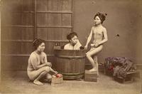 Three women bathing