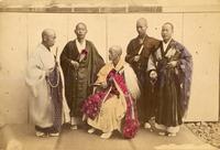Five monks posing